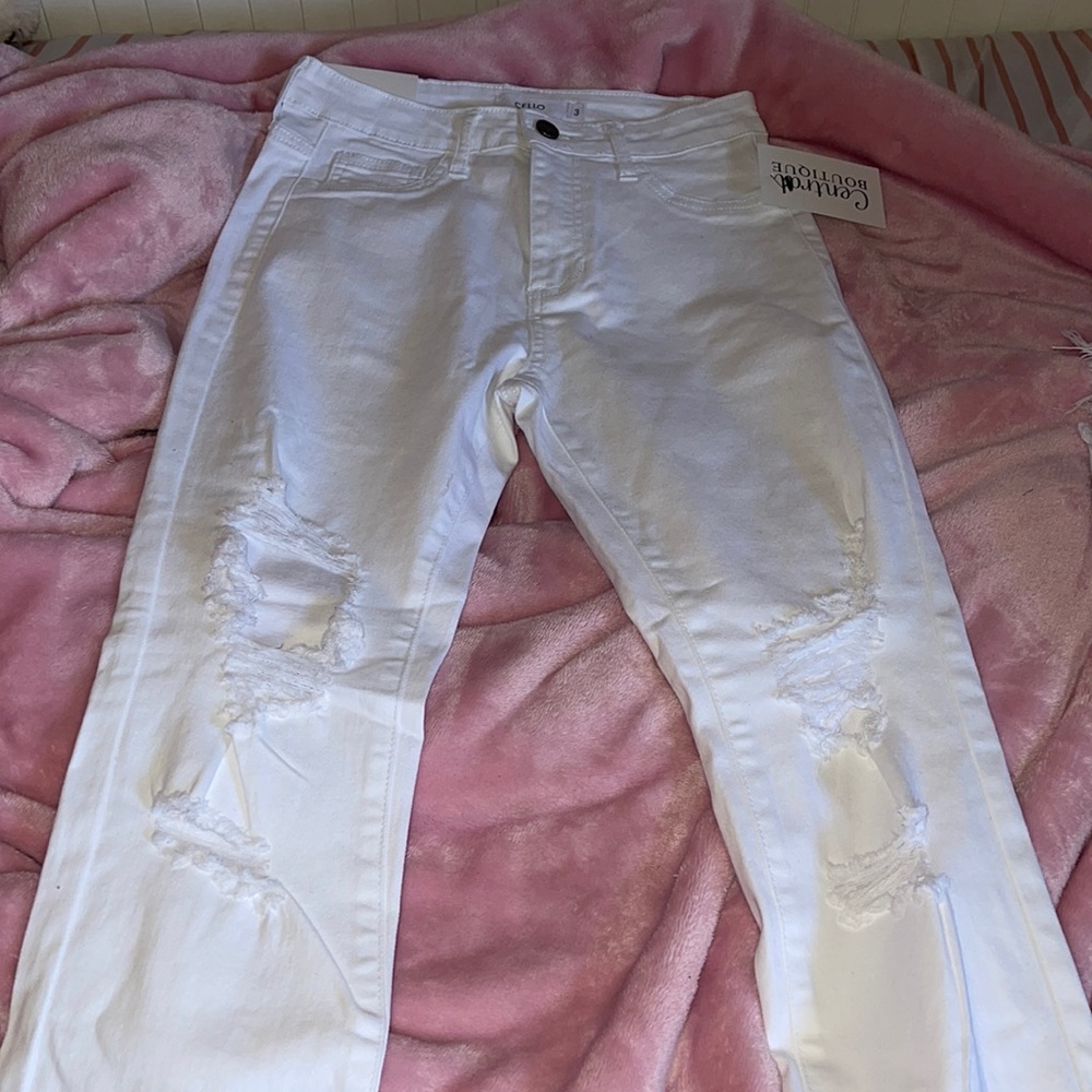White high waisted ripped jeans
